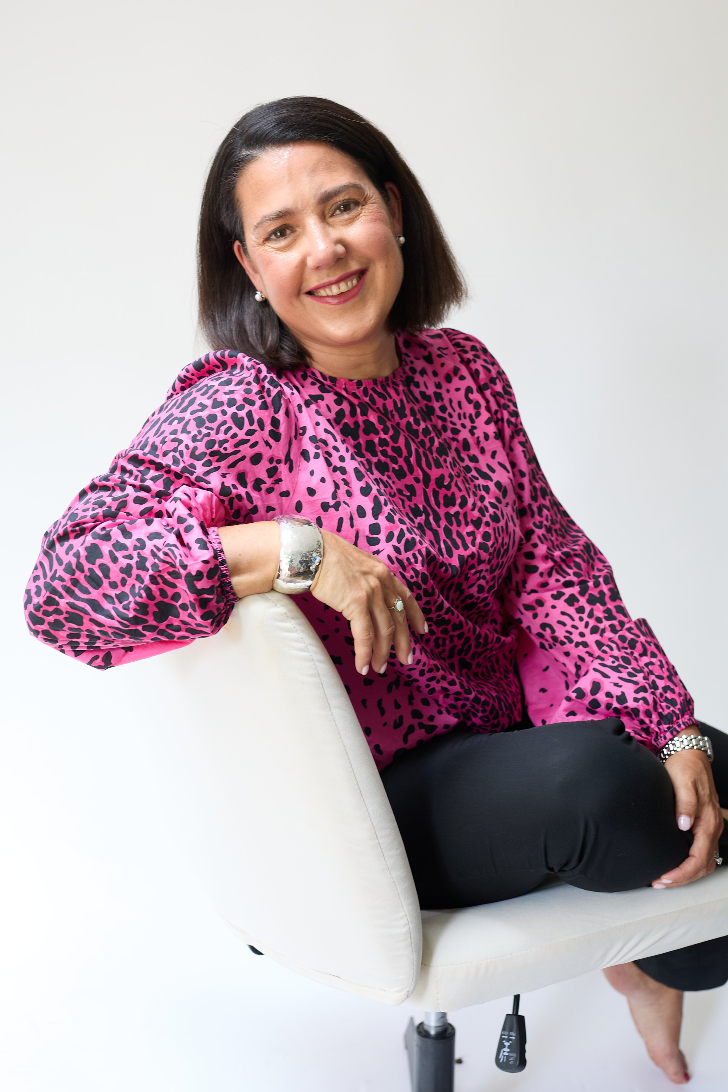 Professional headshot — warm, approachable executive portrait